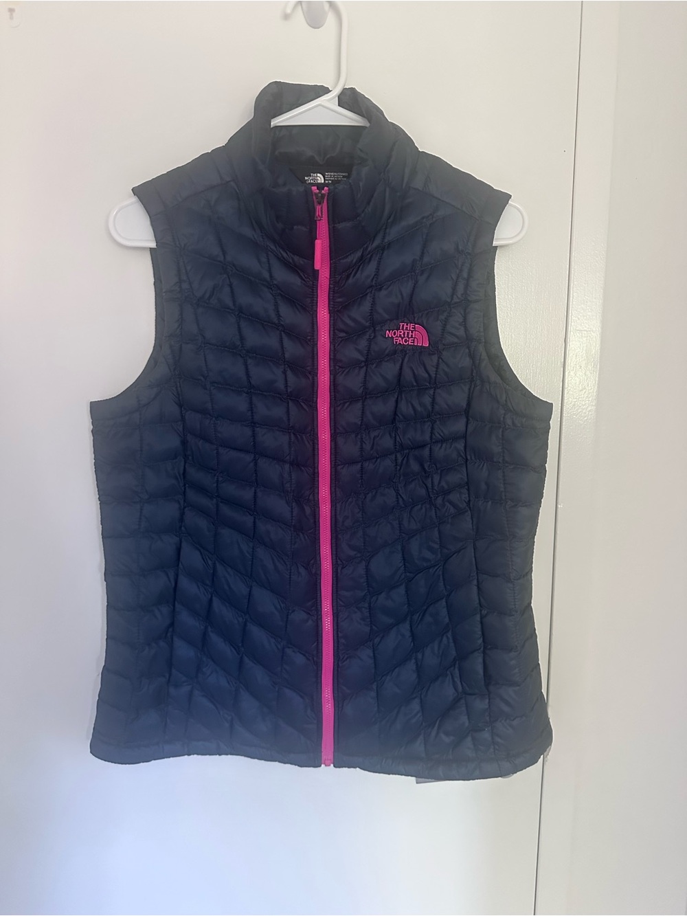 The North Face Black Quilted Vest with Pink Accents size M